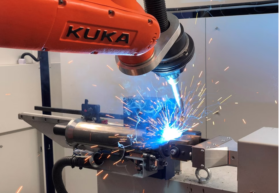 Процесс сварки корпуса амортизатора на роботизированном комплексе для MIG/MAG сварки штоков и корпусов амортизаторов